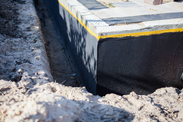 Professional Waterproofing technician working in Boswell, PA